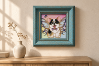 Styled interior view of a vintage-blue corgi portrait frame above an oak console