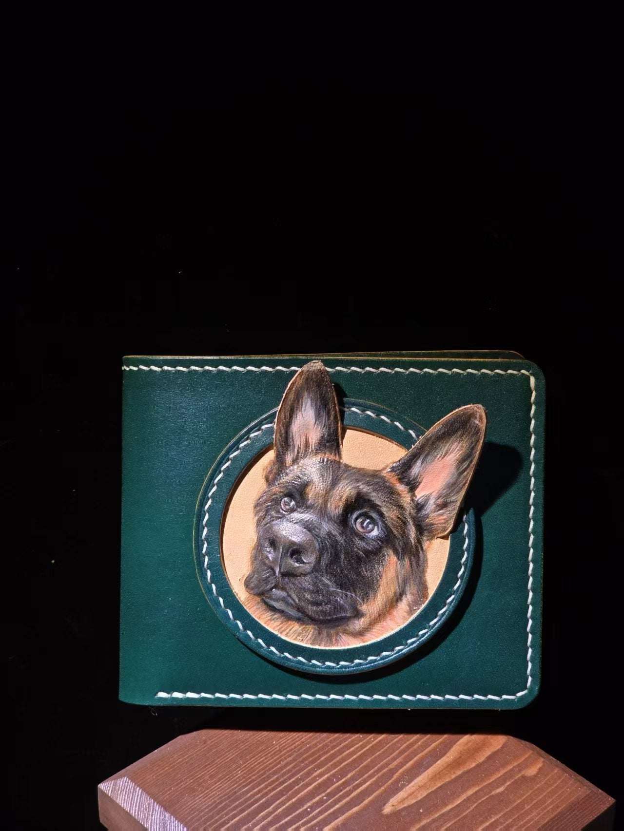 Supplier photograph of a green leather wallet with a German shepherd portrait.